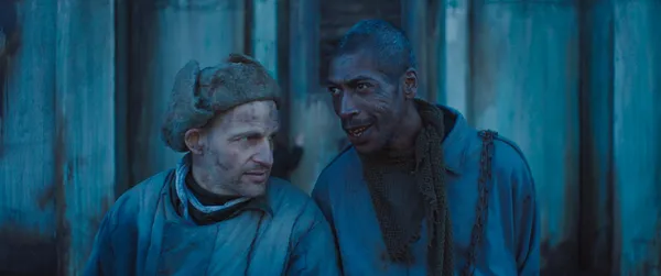 K (Johann Myers) and Z (Géza Röhrig) in Undergods. Chino Moya: 'These characters have completely lost their identities, and all they have is a letter and a number'