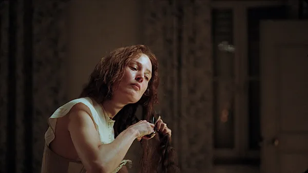 Vicky Krieps cutting her hair