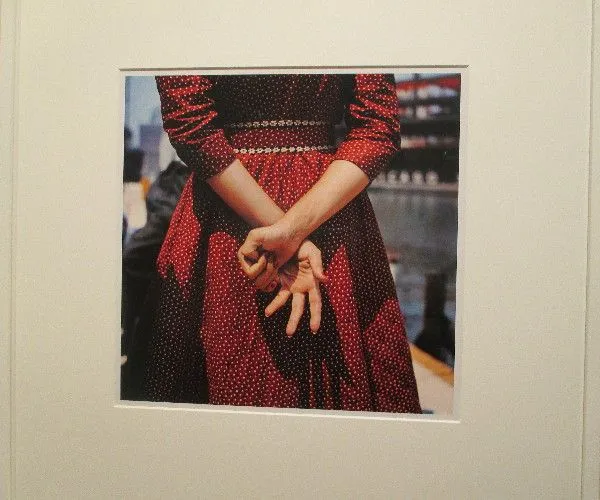 Woman in a red dress with white dots