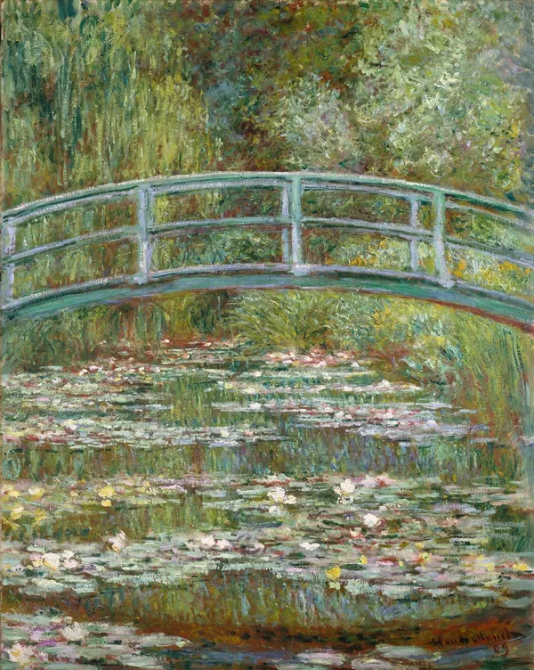 Bridge Over A Pond Of Water Lilies