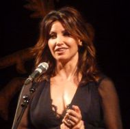 
                                Gina Gershon - photo by John Leach