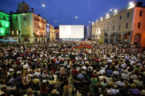 Don't rain on our parade: the Piazza Grande crowd before the heavens opened at the opening ceremony in 2013