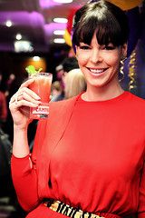 Pollyanna McIntosh enjoying a drink.