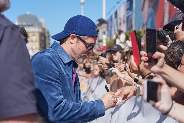 Brad Pitt signs autographs in San Sebastian